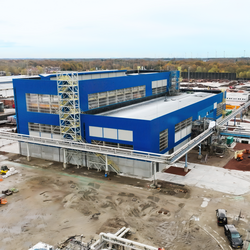 Photo: Aurubis: A large hall with a blue facade, shot from above